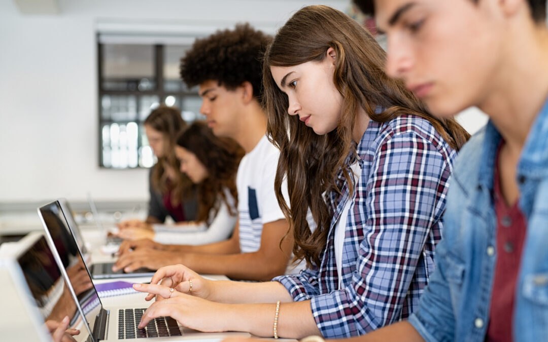 High school students learning keyboarding at school in 2023